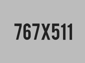 A gray background with black numbers on it.